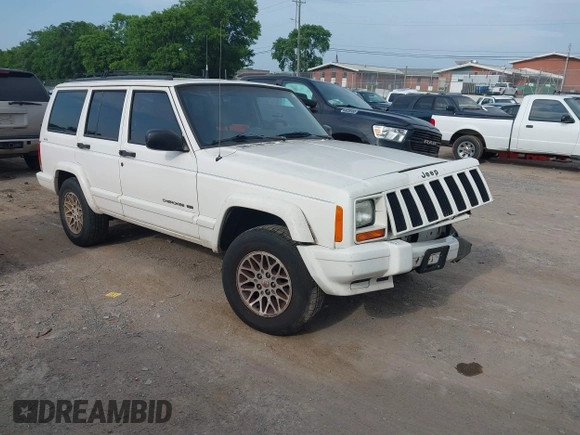 1998 Jeep Cherokee Sport z VIN 1J4FJ68S6WL124839, wystawiony jako IAAI lot #42421174 z przebiegiem 167 762 mil mil oraz . Historia ofert i sprzedaży dostępna na DreamBid. Obrazek 1.