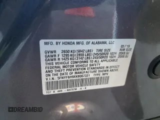 2019 Honda Pilot Touring 8-Passenger z VIN 5FNYF6H9XKB067331, wystawiony jako Copart lot #54424905 z przebiegiem 93 991 mil mil oraz Szkoda całkowita • Salvage title. Historia ofert i sprzedaży dostępna na DreamBid. Obrazek 14.