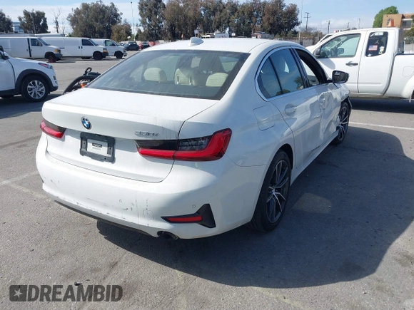 2019 BMW 3 Series 330i with VIN WBA5R1C55KAK12332, listed as a IAAI auction lot 41692035 with 13,657 mi miles and . Bid and sale history available at DreamBid. Image 4.