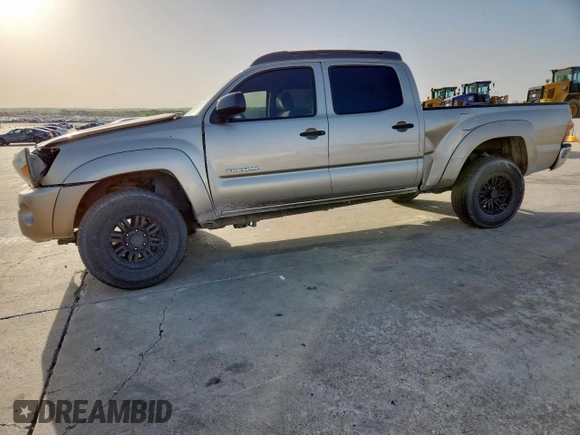2005 Toyota Tacoma PreRunner z VIN 3TMKU72N85M003408, wystawiony jako Copart lot #57670935 z przebiegiem 247 189 mil mil oraz Szkoda całkowita • Salvage title. Historia ofert i sprzedaży dostępna na DreamBid. Obrazek 1.