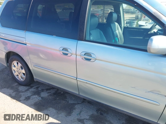 2003 Honda Odyssey EX-L with VIN 5FNRL18973B148675, listed as a IAAI auction lot 41992952 with 232,013 mi miles and . Bid and sale history available at DreamBid. Image 20.