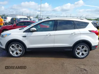 2019 Ford Escape Titanium with VIN 1FMCU9J98KUA95238, listed as a IAAI auction lot 42525324 with 59,222 mi miles and . Bid and sale history available at DreamBid. Image 14.