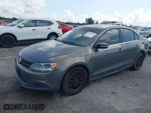 2013 Volkswagen Jetta SE with VIN 3VWDP7AJ1DM280251, listed as a IAAI auction lot 42391472 with 98,788 mi miles and . Bid and sale history available at DreamBid. Image 2.