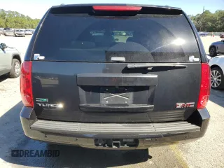 2011 GMC Yukon SLE with VIN 1GKS1AE02BR213992, listed as a Copart auction lot 75609704 with 133,536 mi miles and Salvage Title. Bid and sale history available at carsss.com. Image 6.
