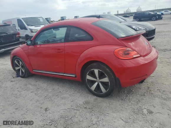 2012 Volkswagen Beetle 2.0T Turbo w/Sun/Sound with VIN 3VWV67ATXCM651866, listed as a Copart auction lot 43918205 with 94,896 mi miles and Salvage Title. Bid and sale history available at carsss.com. Image 2.