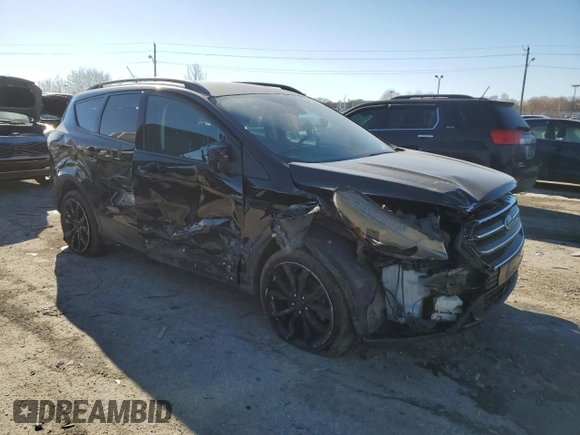 2017 Ford Escape Titanium with VIN 1FMCU9JD0HUC74354, listed as a Copart auction lot 42356345 with 184,816 mi miles and Salvage Title. Bid and sale history available at carsss.com. Image 4.