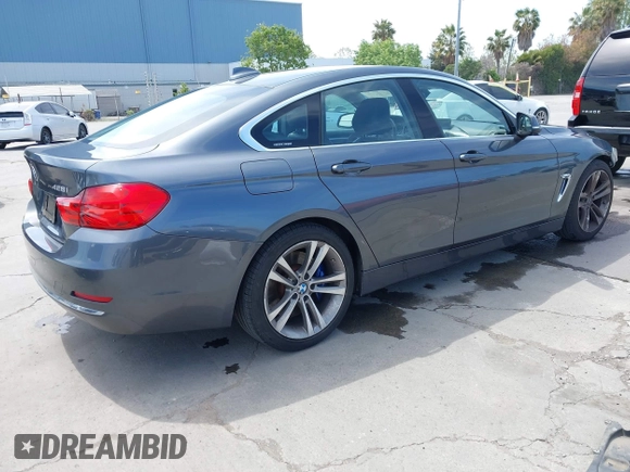 2015 BMW 4 Series 428i with VIN WBA4A5C59FGK15750, listed as a IAAI auction lot 42098856 with 62,530 mi miles and . Bid and sale history available at DreamBid. Image 4.