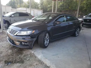 2014 Volkswagen CC R-Line with VIN WVWBP7AN1EE520189, listed as a Copart auction lot 75035404 with 65,421 mi miles and Salvage Title. Bid and sale history available at carsss.com. Image 1.