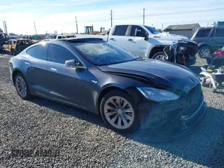 2014 Tesla Model S P85D with VIN 5YJSA1H23EFP64452, listed as a IAAI auction lot 41573176 with 155,634 mi miles and . Bid and sale history available at DreamBid. Image 1.