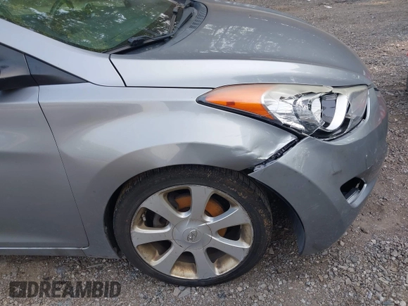 2012 Hyundai Elantra Limited with VIN KMHDH4AE0CU374001, listed as a IAAI auction lot 42394880 with 99,282 mi miles and . Bid and sale history available at DreamBid. Image 6.