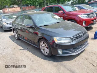 2012 Volkswagen Jetta GLI Autobahn z VIN 3VW5A7AJ7CM347083, wystawiony jako IAAI lot #42414664 z przebiegiem 123 886 mil mil oraz . Historia ofert i sprzedaży dostępna na DreamBid. Obrazek 1.
