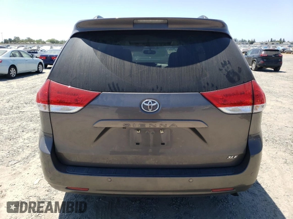 2012 Toyota Sienna XLE AAS z VIN 5TDYK3DC5CS209528, wystawiony jako Copart lot #60453395 z przebiegiem 166 320 mil mil oraz Szkoda całkowita • Salvage title. Historia ofert i sprzedaży dostępna na DreamBid. Obrazek 6.