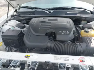 2013 Dodge Challenger SXT with VIN 2C3CDYAG9DH734248, listed as a IAAI auction lot 41837944 with 113,142 mi miles. Bid and sale history available at carsss.com. Image 10.