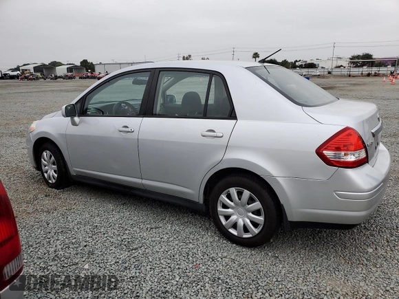 2011 Nissan Versa S with VIN 3N1BC1AP9BL458761, listed as a Copart auction lot 57317115 with 122,606 mi miles and Salvage title. Bid and sale history available at DreamBid. Image 2.