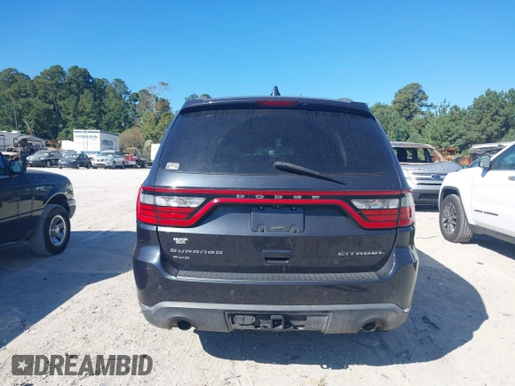 2014 Dodge Durango Citadel with VIN 1C4SDJETXEC390326, listed as a IAAI auction lot 40620779 with 119,537 mi miles and . Bid and sale history available at DreamBid. Image 16.