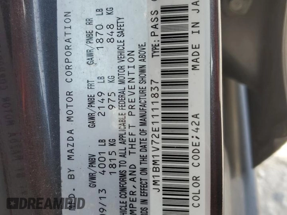 2014 Mazda 3 i Touring with VIN JM1BM1V72E1111837, listed as a Copart auction lot 82809144 with 136,326 mi miles and Salvage Title. Bid and sale history available at DreamBid. Image 12.