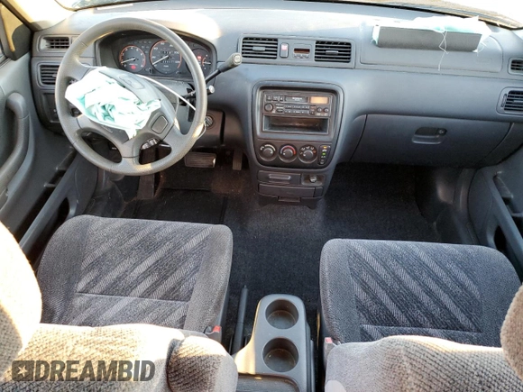 2000 Honda CR-V LX with VIN JHLRD1848YC038520, listed as a Copart auction lot 74137634 with 104,332 mi miles and Salvage Title. Bid and sale history available at carsss.com. Image 8.