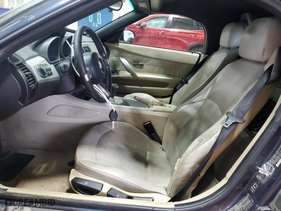 2004 BMW Z4 2.5i with VIN 4USBT33594LR68329, listed as a Copart auction lot 80978804 with 169,771 mi miles and Salvage Title. Bid and sale history available at carsss.com. Image 7.