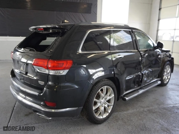 2014 Jeep Grand Cherokee Summit with VIN 1C4RJFJG5EC340768, listed as a Copart auction lot 48050645 with 119,377 mi miles and Salvage Title. Bid and sale history available at carsss.com. Image 3.