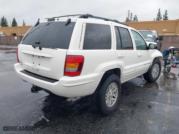 2004 Jeep Grand Cherokee Limited with VIN 1J4GW58S24C417604, listed as a IAAI auction lot 41578234 with 1 mi miles. Bid and sale history available at carsss.com. Image 4.