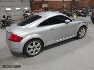 2002 Audi TT with VIN TRUWC28N521010684, listed as a IAAI auction lot 42116565 with 130,917 mi miles. Bid and sale history available at carsss.com. Image 4.