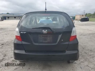 2009 Honda Fit with VIN JHMGE88249S068080, listed as a Copart auction lot 52469735 with 222,156 mi miles and Clean Title. Bid and sale history available at carsss.com. Image 6.