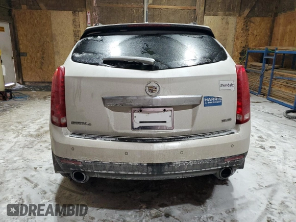 2013 Cadillac SRX Premium Collection с VIN 3GYFNJE35DS549948, выставлен на аукционе Copart как лот 45654295 с пробегом 79 793 миль миль и Чистый • Clean title. История ставок и продаж доступна на DreamBid. Изображение 6.