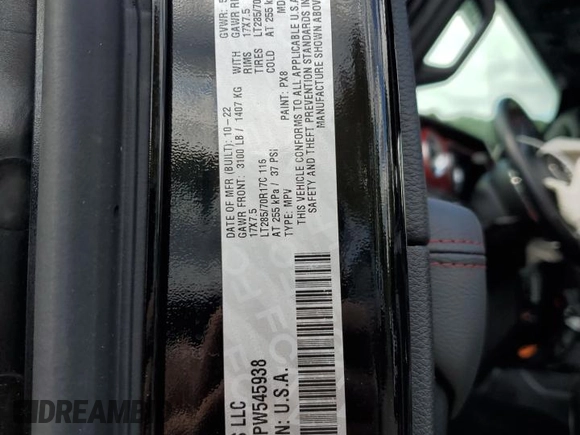 2023 Jeep Wrangler Rubicon with VIN 1C4HJXCGXPW545938, listed as a Copart auction lot 73939634 with 13,590 mi miles and Salvage title. Bid and sale history available at DreamBid. Image 12.