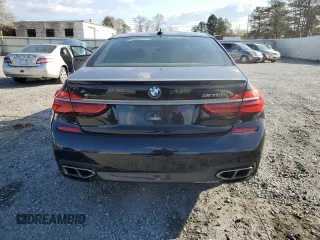 2019 BMW 7 Series M760i xDrive with VIN WBA7H6C55KG615037, listed as a Copart auction lot 80218404 with 43,405 mi miles and Salvage Title. Bid and sale history available at carsss.com. Image 6.