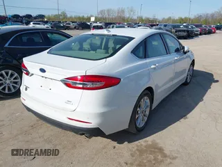 2019 Ford Fusion SE with VIN 3FA6P0HD6KR265995, listed as a IAAI auction lot 42097079 with 112,713 mi miles. Bid and sale history available at carsss.com. Image 4.