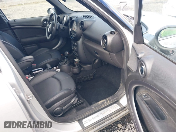 2014 MINI Countryman S with VIN WMWZC3C56EWP26003, listed as a IAAI auction lot 41884630 with 101,683 mi miles and . Bid and sale history available at DreamBid. Image 5.