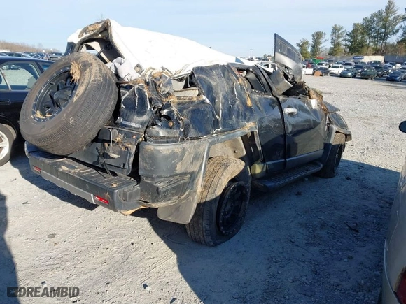 2007 Toyota FJ Cruiser with VIN JTEZU11FX70016328, listed as a IAAI auction lot 41596402 with 258,836 mi miles. Bid and sale history available at carsss.com. Image 4.