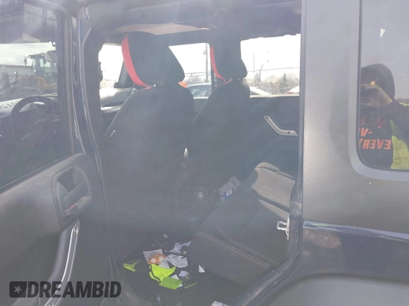 2013 Jeep Wrangler Unlimited Rubicon with VIN 1C4BJWFGXDL502435, listed as a IAAI auction lot 41937642 with 83,817 mi miles and . Bid and sale history available at DreamBid. Image 8.
