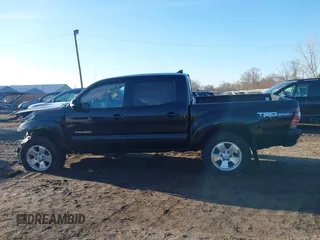 2015 Toyota Tacoma with VIN 3TMLU4EN4FM190968, listed as a IAAI auction lot 41749985 with 152,668 mi miles and . Bid and sale history available at DreamBid. Image 14.