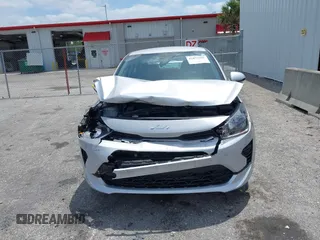 2023 Kia Rio S z VIN 3KPA24AD4PE604207, wystawiony jako IAAI lot #42077201 z przebiegiem 16 559 mil mil oraz . Historia ofert i sprzedaży dostępna na DreamBid. Obrazek 6.