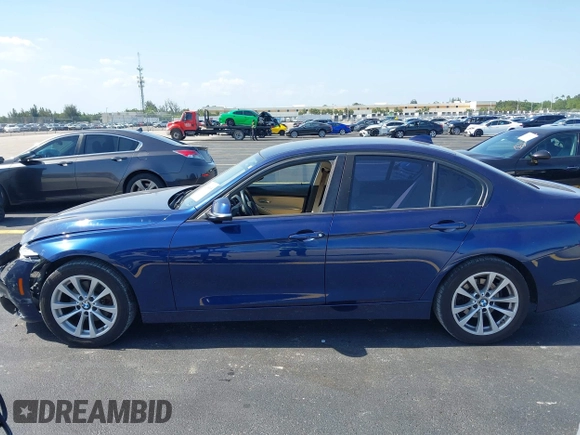 2018 BMW 3 Series 320i with VIN WBA8A9C52JK622825, listed as a IAAI auction lot 42285685 with 74,453 mi miles and . Bid and sale history available at DreamBid. Image 14.