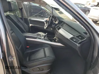 2012 BMW X5 35i with VIN 5UXZV4C51CL764495, listed as a Copart auction lot 48718915 with Not provided miles and Salvage title. Bid and sale history available at DreamBid. Image 7.