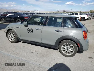 2019 MINI Hardtop 4 Door Cooper S z VIN WMWXU3C56K2H86566, wystawiony jako Copart lot #54783635 z przebiegiem 62 916 mil mil oraz Szkoda całkowita • Salvage title. Historia ofert i sprzedaży dostępna na DreamBid. Obrazek 2.