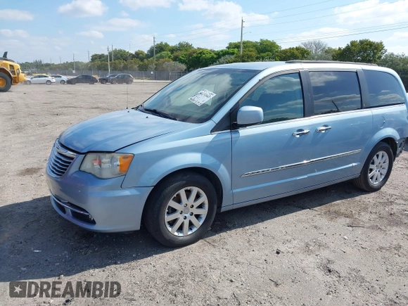 2013 Chrysler Town & Country Touring with VIN 2C4RC1BG3DR736862, listed as a IAAI auction lot 42131041 with 130,505 mi miles and . Bid and sale history available at DreamBid. Image 2.