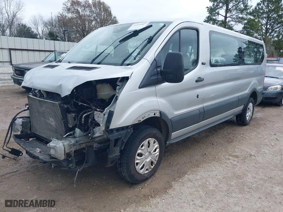 2018 Ford Transit Passenger Wagon XL with VIN 1FBZX2ZMXJKB02176, listed as a IAAI auction lot 41455827 with 75,340 mi miles. Bid and sale history available at carsss.com. Image 2.