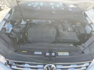2021 Volkswagen Tiguan S z VIN 3VV1B7AX1MM155177, wystawiony jako Copart lot #70585534 z przebiegiem Nie podano mil oraz Szkoda całkowita • Salvage title. Historia ofert i sprzedaży dostępna na DreamBid. Obrazek 12.