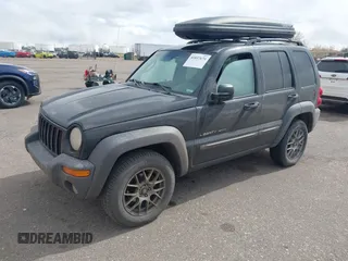 2002 Jeep Liberty Sport with VIN 1J4GL48K02W313000, listed as a IAAI auction lot 41837671 with 168,362 mi miles. Bid and sale history available at carsss.com. Image 2.