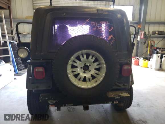 2004 Jeep Wrangler Sport z VIN 1J4FA49S44P746039, wystawiony jako Copart lot #51982795 z przebiegiem Nie podano mil oraz Czysty tytuł • Clean title. Historia ofert i sprzedaży dostępna na DreamBid. Obrazek 6.
