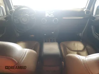 2015 Jeep Wrangler Unlimited Sahara с VIN 1C4HJWEG0FL560973, выставлен на аукционе Copart как лот 59552135 с пробегом 135 057 миль миль и Чистый • Clean title. История ставок и продаж доступна на DreamBid. Изображение 8.