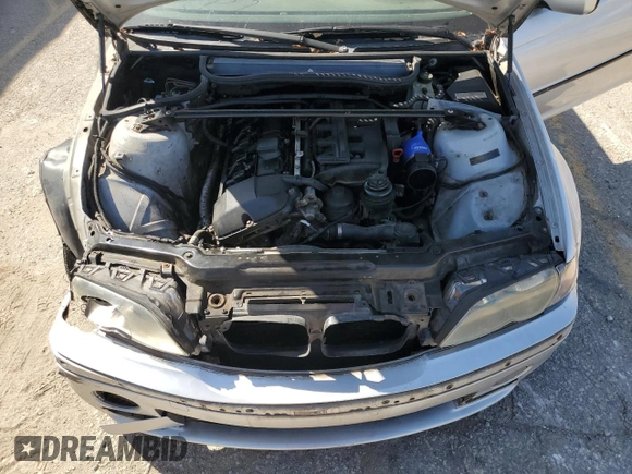2003 BMW 3 Series 330xi with VIN WBAEW53413PG09450, listed as a Copart auction lot 74111954 with 252,295 mi miles and Salvage Title. Bid and sale history available at carsss.com. Image 14.