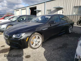 2015 BMW 6 Series 640i xDrive with VIN WBA6B8C58FD453288, listed as a Copart auction lot 80277964 with 100,079 mi miles and Salvage Title. Bid and sale history available at carsss.com. Image 1.