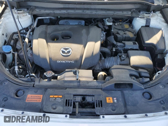 2021 Mazda CX-5 Grand Touring with VIN JM3KFBDM3M1305807, listed as a Copart auction lot 42713655 with 58,162 mi miles and Salvage Title. Bid and sale history available at DreamBid. Image 14.