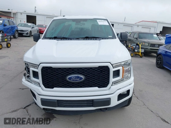 2018 Ford F-150 XL with VIN 1FTEW1E54JFB51565, listed as a IAAI auction lot 41942276 with 131,864 mi miles. Bid and sale history available at carsss.com. Image 13.