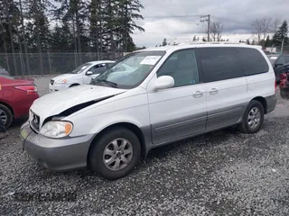 2005 Kia Sedona LX with VIN KNDUP132X56742698, listed as a IAAI auction lot 41637967 with 118,346 mi miles. Bid and sale history available at carsss.com. Image 18.