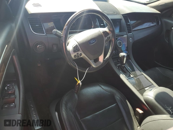 2013 Ford Taurus Limited with VIN 1FAHP2F80DG167100, listed as a Copart auction lot 57815055 with 198,364 mi miles and Salvage title. Bid and sale history available at DreamBid. Image 8.